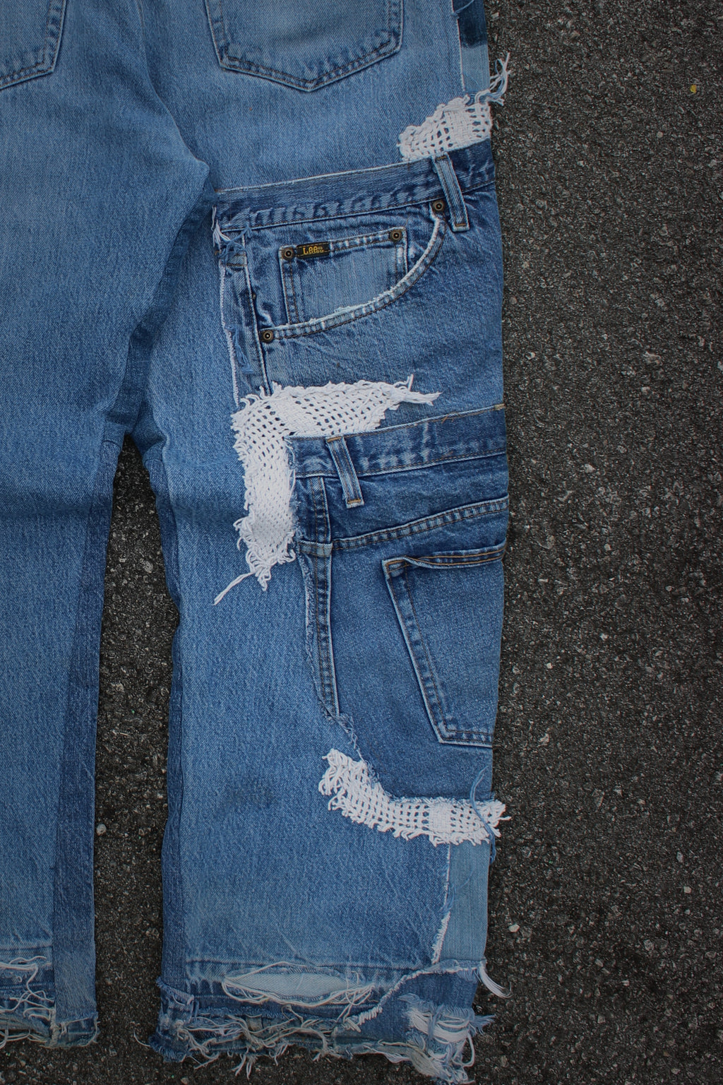 DISTRESSED PATCHWORK/CROCHET DENIM JEANS