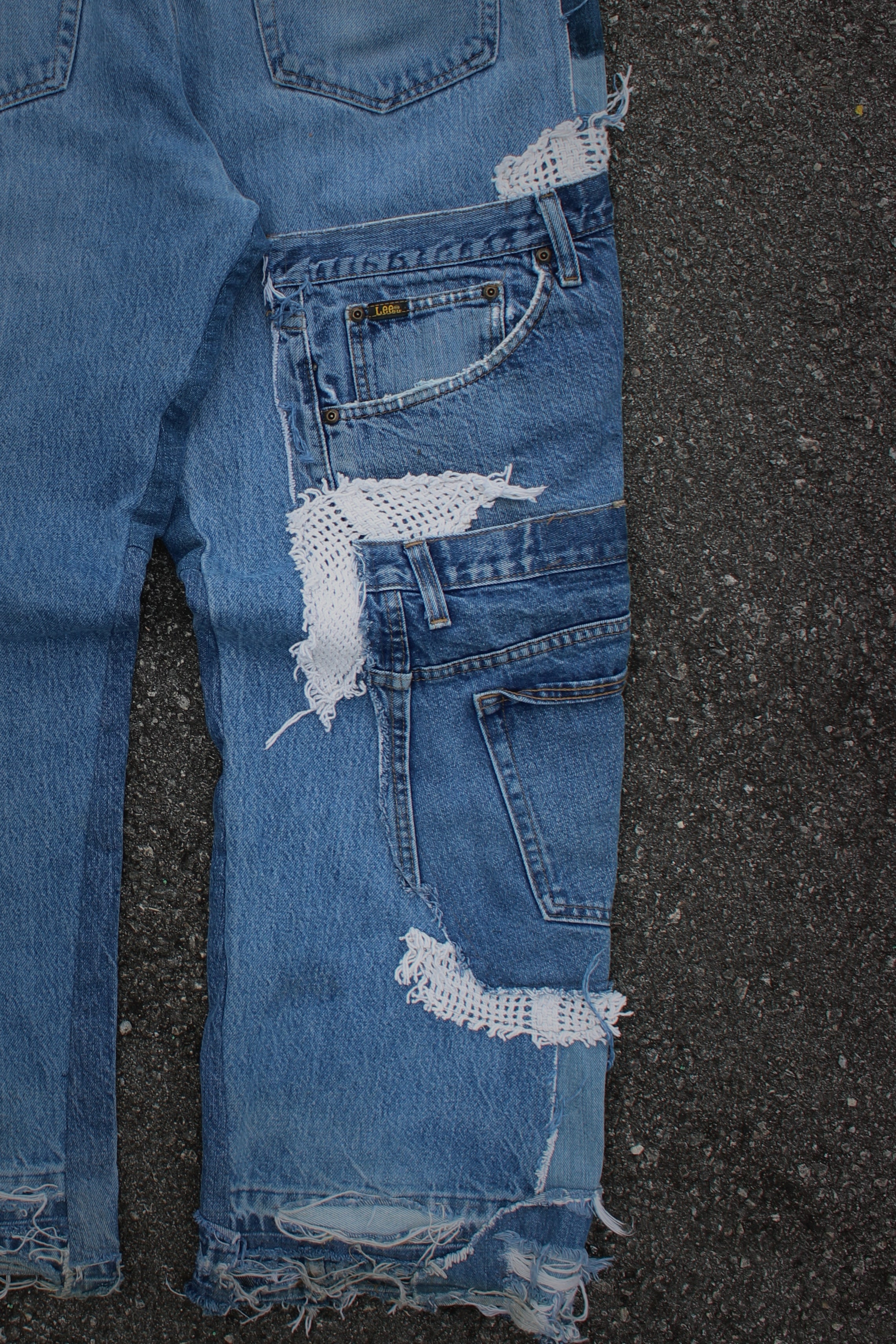 DISTRESSED PATCHWORK/CROCHET DENIM JEANS